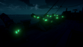 The Cannons on a Galleon at night.