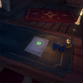 An Athena's Fortune Voyage on a Captain's Table.