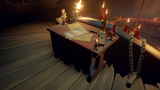 The table at The Reaper's Hideout is in front of The Servant of the Flame.