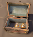 An Ashen Container Chest with 2 Artefacts.